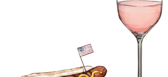 hot dog and glass of wine