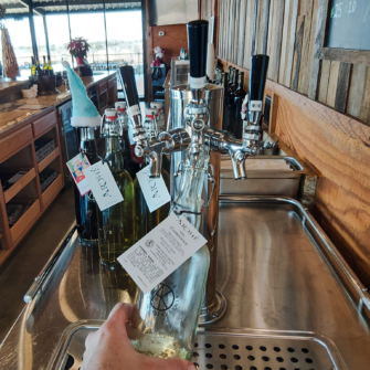 growler filled with chardonnay